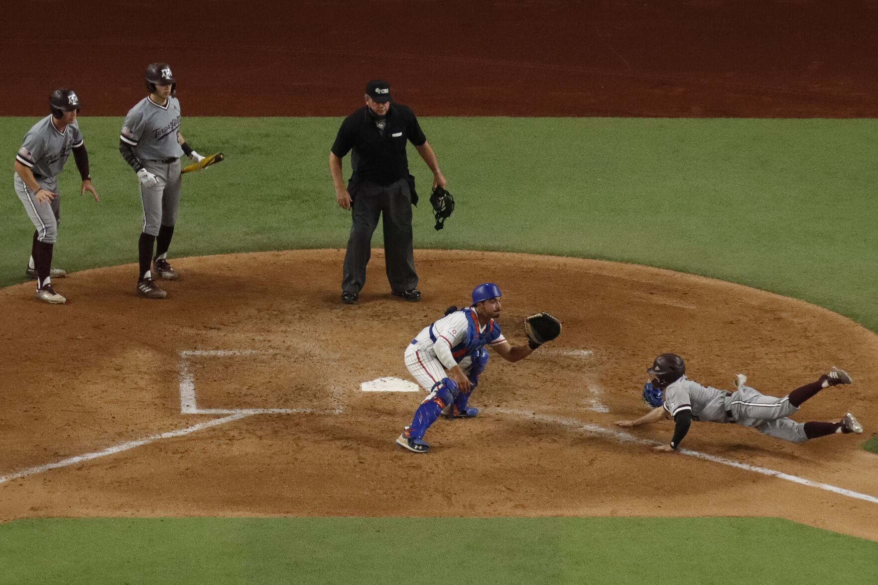 Photos: Mavericks lose 8-4 against Texas A&M University despite early lead